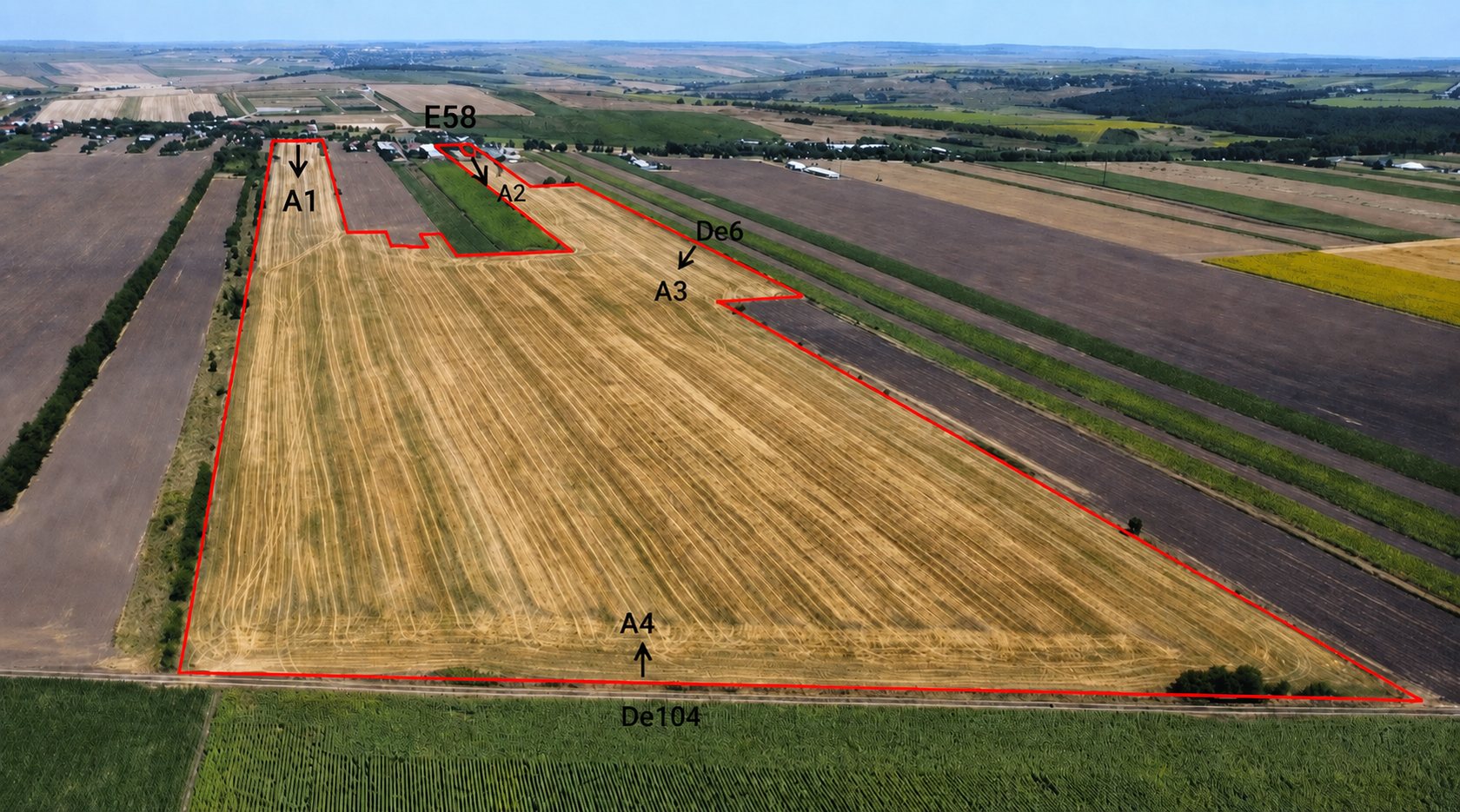 Aerial photograph with the site boundary outlined in red and access points A1 and A2 on E58, A3 on DE6 and A4 on DE104
